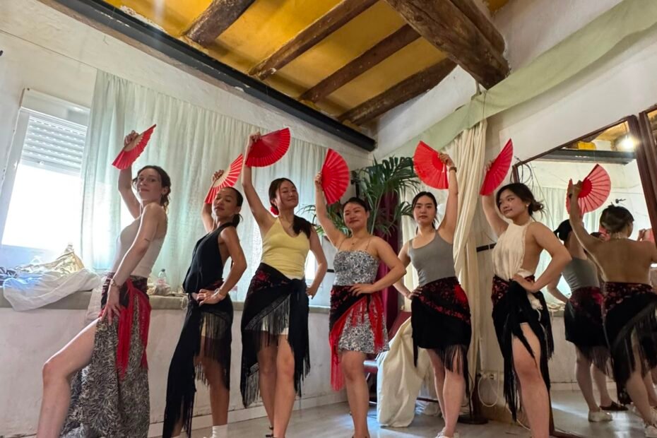 Flamenco dance classes in Barcelona – a group of students with their fans